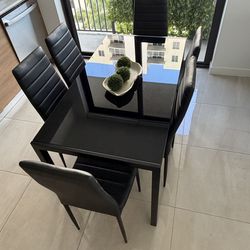 Black glass top dining table w/ 6 chairs