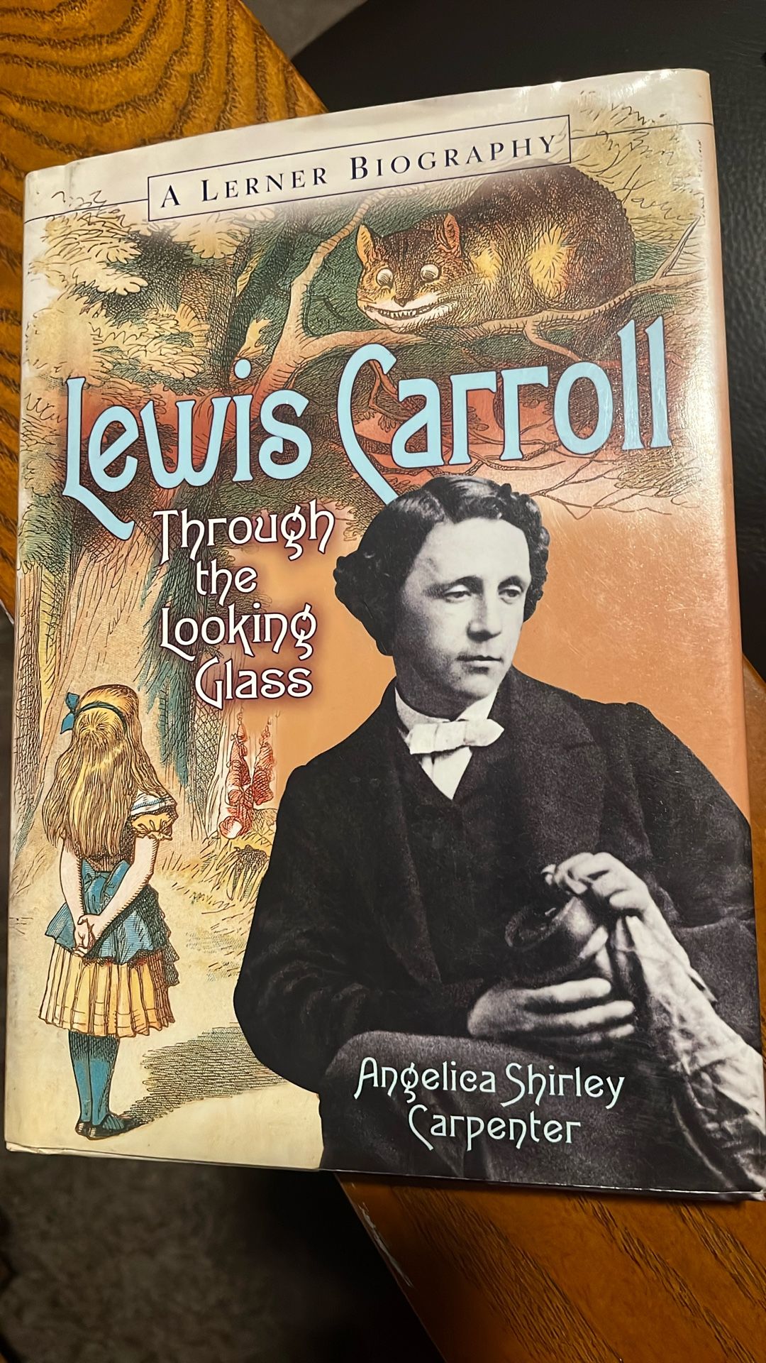 The value of the book "Lewis Carroll: Through the Looking Glass" by Angelica Shirley Carpenter (A Lerner Biography) 