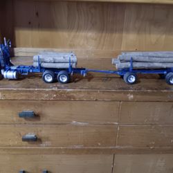 1.25 scale White Freightliner Log Truck and International Transtar $200.00 CASH or CASH APP ONLY 