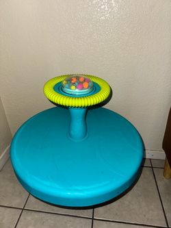 Sit and spin toy