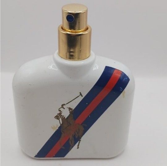 Polo Blue Sport EDT 2.5 fl.oz. color coming off of bottle, no cap