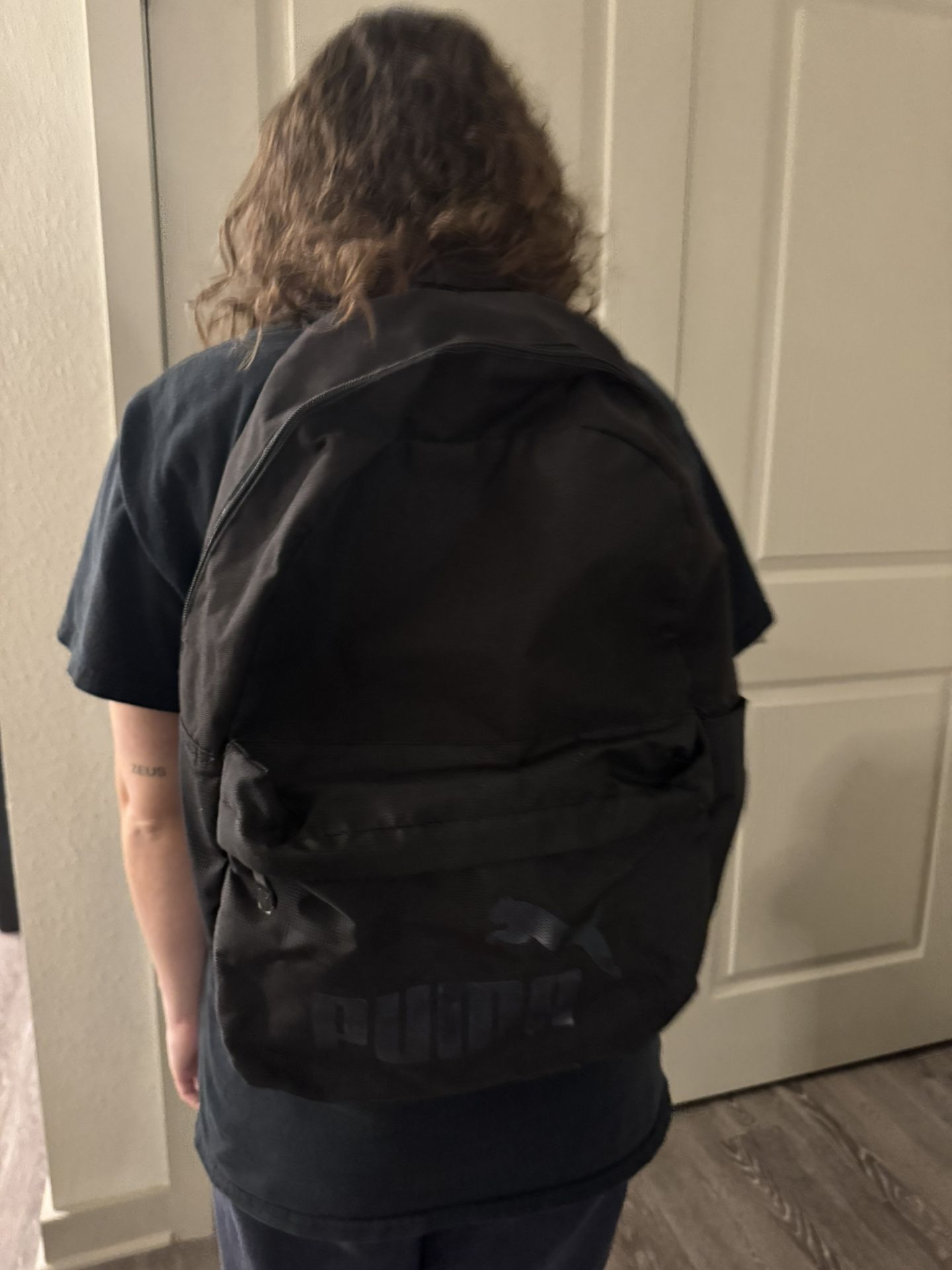 Black Puma Backpack