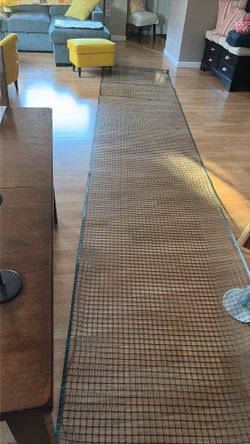 16 feet of plastic  mesh fencing