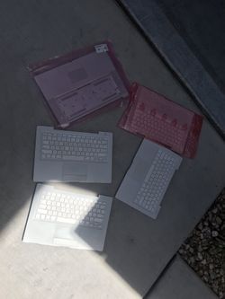 Assorted Apple MacBook palm rests