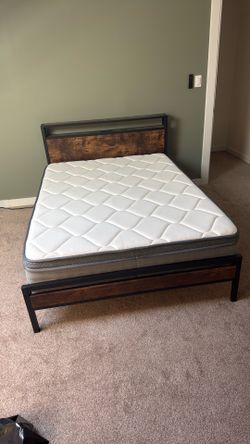 Full sized bed frame with mattress