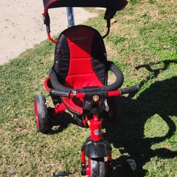 KidsEmbrace Nickelodeon Paw Patrol Marshall 4-in-1 Push and Ride Stroller Tricycle. 