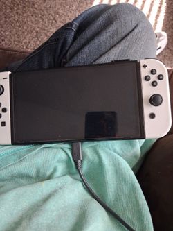 I have a Nintendo switch oled for sale with a docking station and case and all wjres