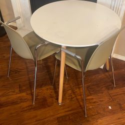 Round Table With Two Chairs