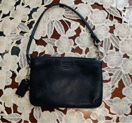 Vintage adorable black leather COACH wristlet/handbag