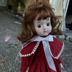 Authentic Heritage Bisque Porcelain Collector's *MUSICAL Doll*Wearing Red Dress* 