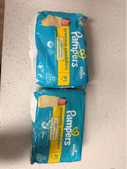 Two packs of preemie diapers