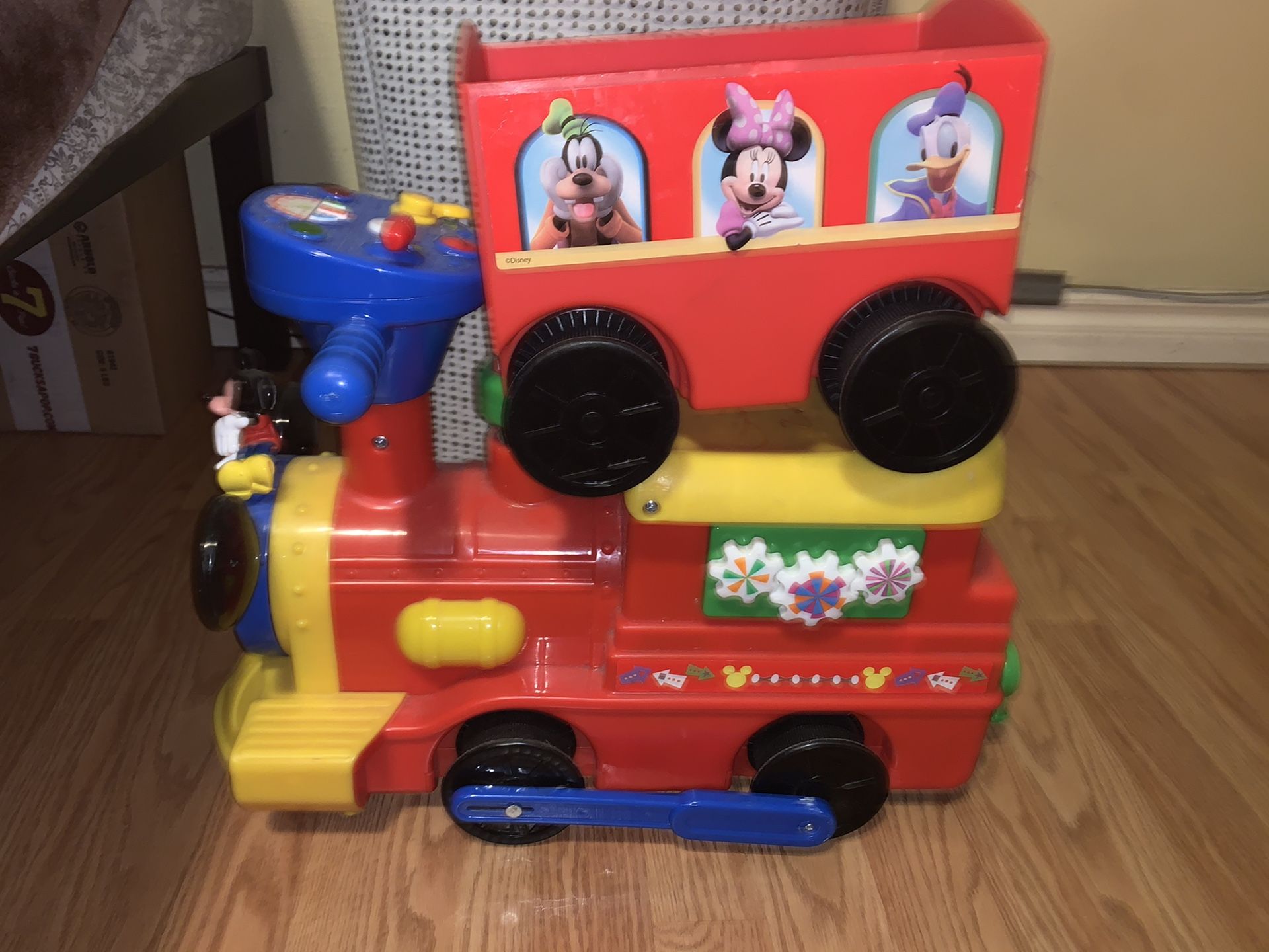 Mickey Mouse train used still works have all the tracks and the load/ trailer cover ...daughter grew out of it .. but never really used it someone e