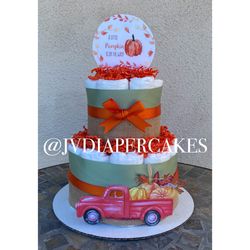 Little pumpkin fall themed diaper cake great for baby showers and centerpiece