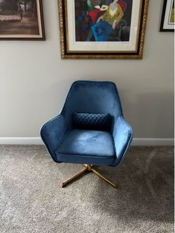 Velvet blue swivel chair