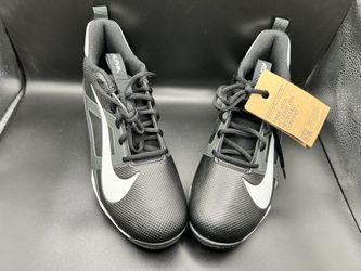 Nike Alpha Menace 4 Shark football cleats in black, white, and light smoke grey