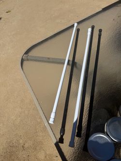 5 curtain rods $10