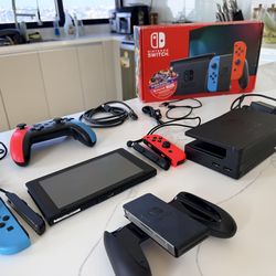 1st gen Nintendo Switch + extra controller + Mario cart