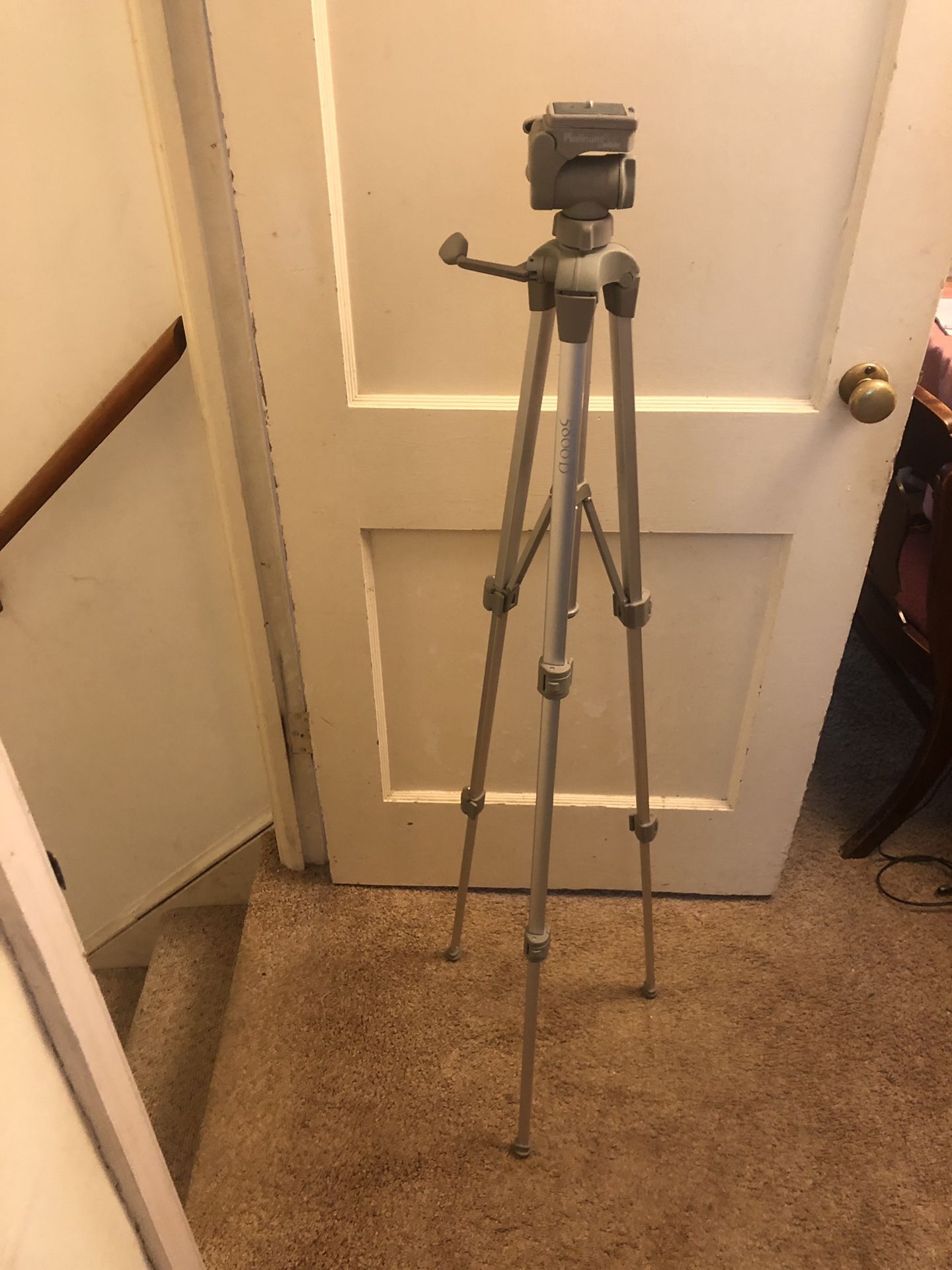 Tripod (collapsible-light weight) platinum plus by Sunpak.