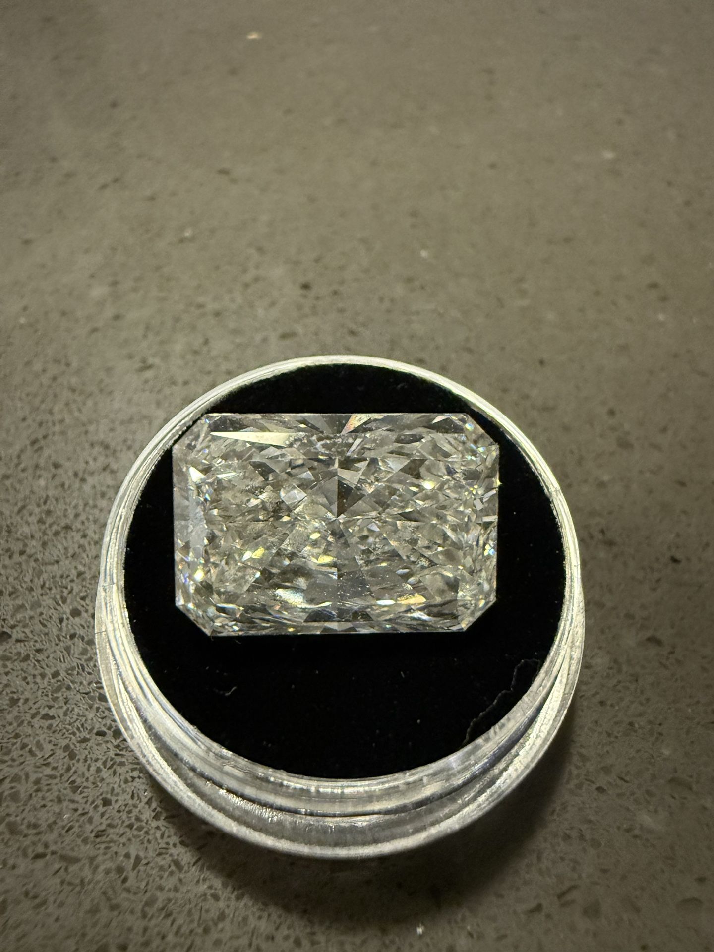 10.76 Ct, cut cornered rectangular modified brilliant, F, VS2, IGI-certified lab-grown diamond