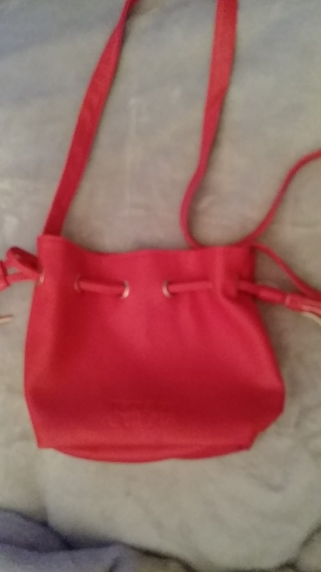 Red. Tanger outlets. Purse. Never used. $3