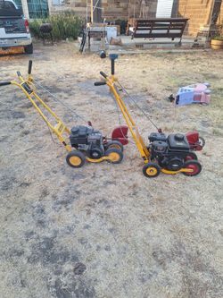 Two Gas-Powered Lawn Edgers Yellow