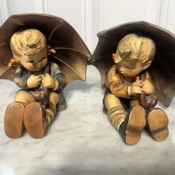 M.I. Hummel “Umbrella Boy” figurine (Mold #152/0 A) & “Umbrella Girl” figurine (Mold #152/0 B)