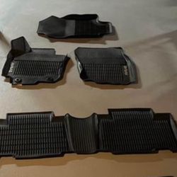 Genuine OEM all-weather floor liner mat set for a 2013-2018 Toyota RAV4