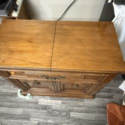 Real wood cabinets with open wing perfect for party buffet