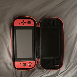Red Nintendo Switch + Case