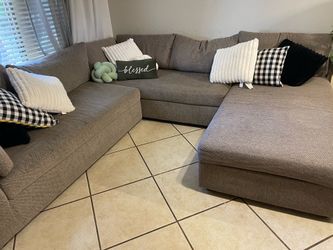 Sectional couch gray color delivery available with extra fee