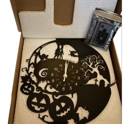 Nightmare Before Christmas themed vinyl record wall clock.  LED Lights.
