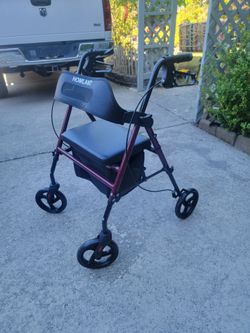 Holland 4 wheel walker with seat