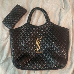 Black YSL leather tote bag with gold accents #luxuryhandbags