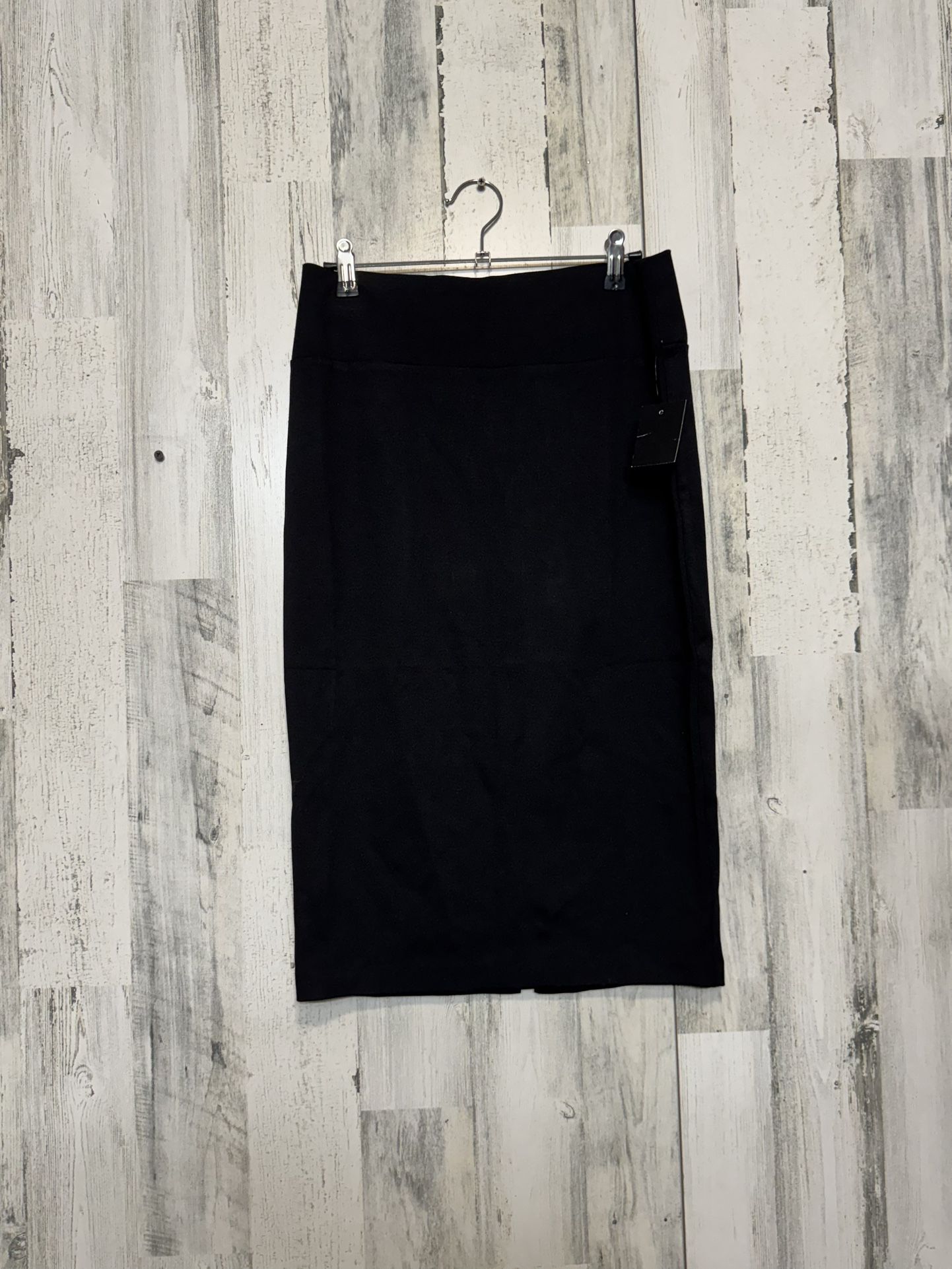 Sabrina’s black pencil skirt