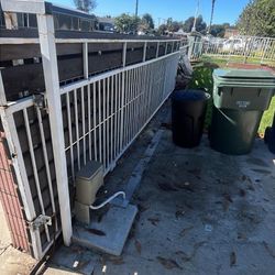 Electric gate noisy or moving uneven? Chain, motor, sensors, and full gate issues