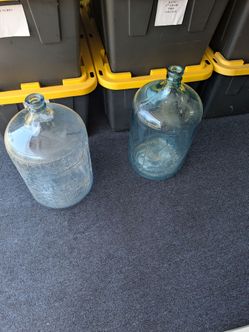 Two antique water bottles