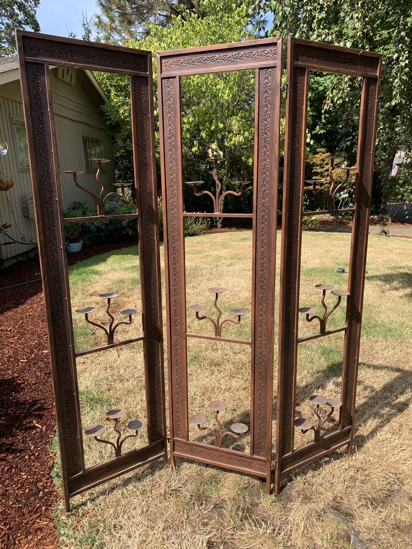 Trifold decorative candle room divider. Each panel is 70” High x 18