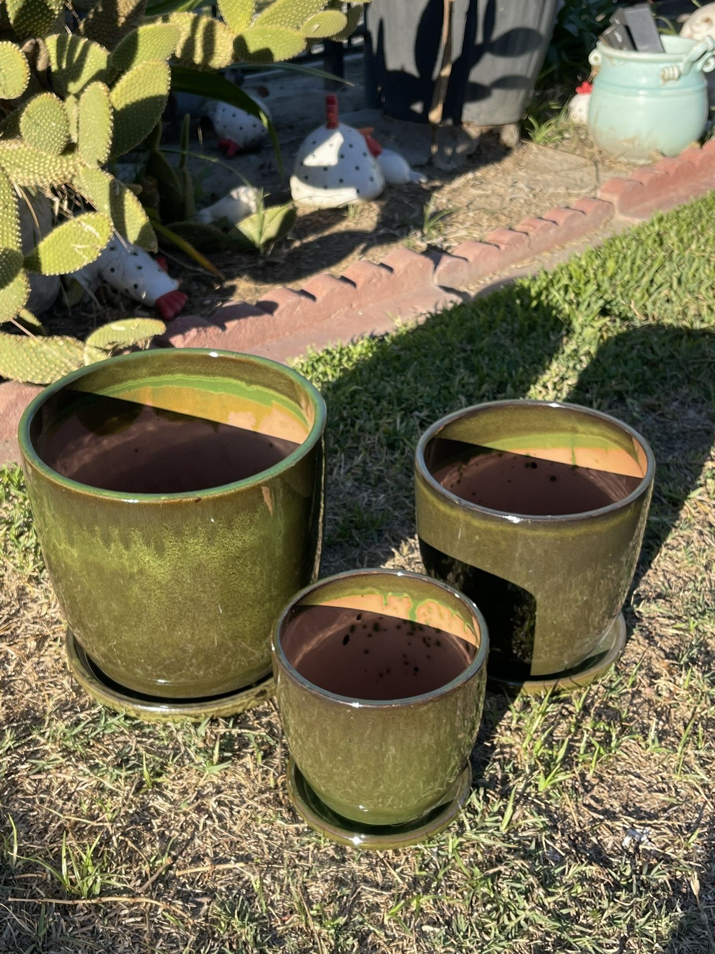 Dark Green Ceramic Pots With Saucer Attached ($70 set of three pieces)