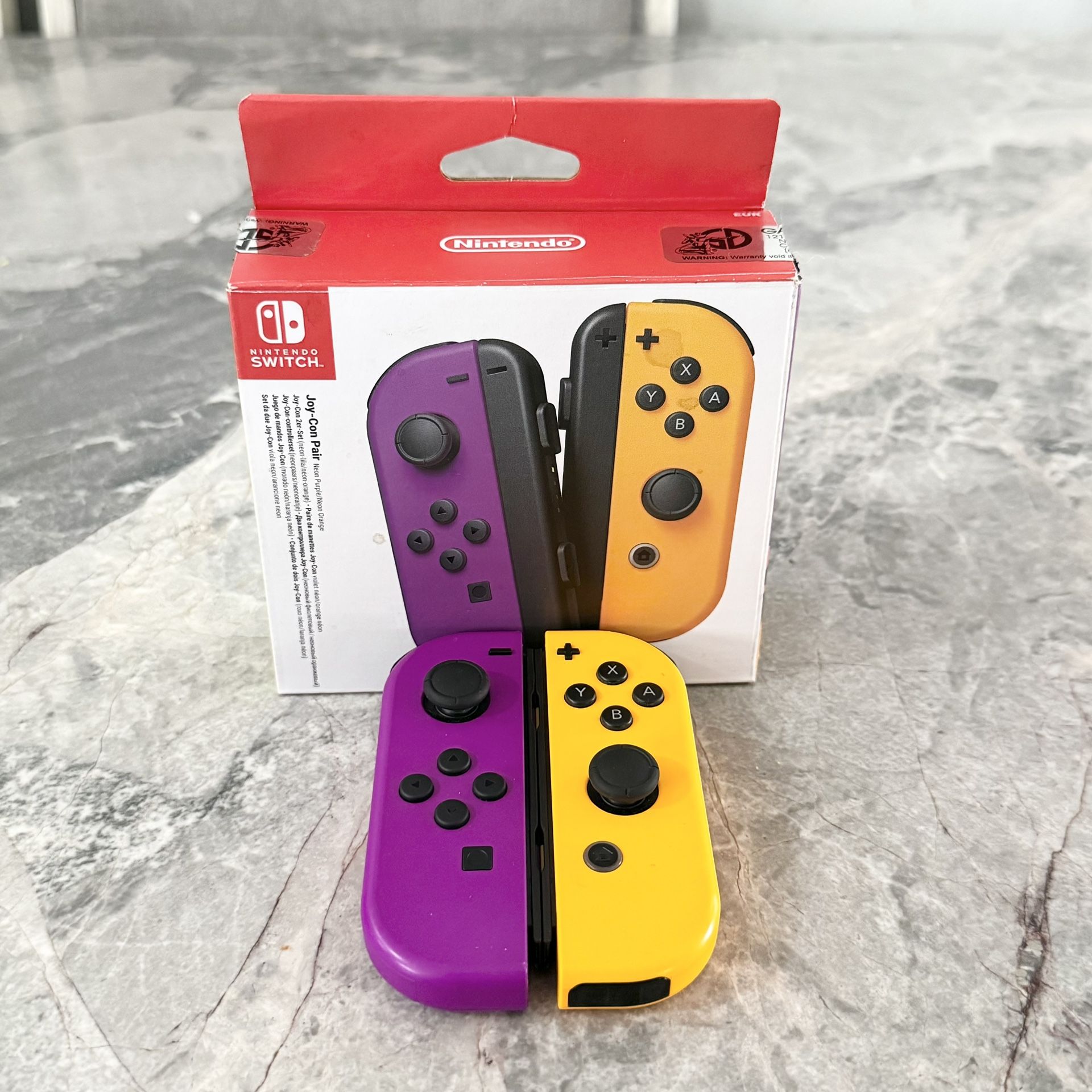 Nintendo Switch Joycons Purple and Yellow with Box