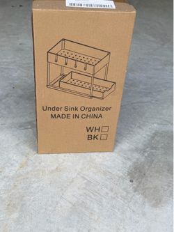 2- two tier blk plastic shelf’s for above and under cabinet