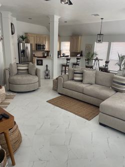 Lounge couch with swivel round chair