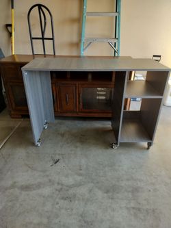 Desk..Gray..48 by 32..On Rollers..Good Shape