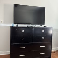 Queen bed frame, dresser with glass top and mirror, side table, two lamps