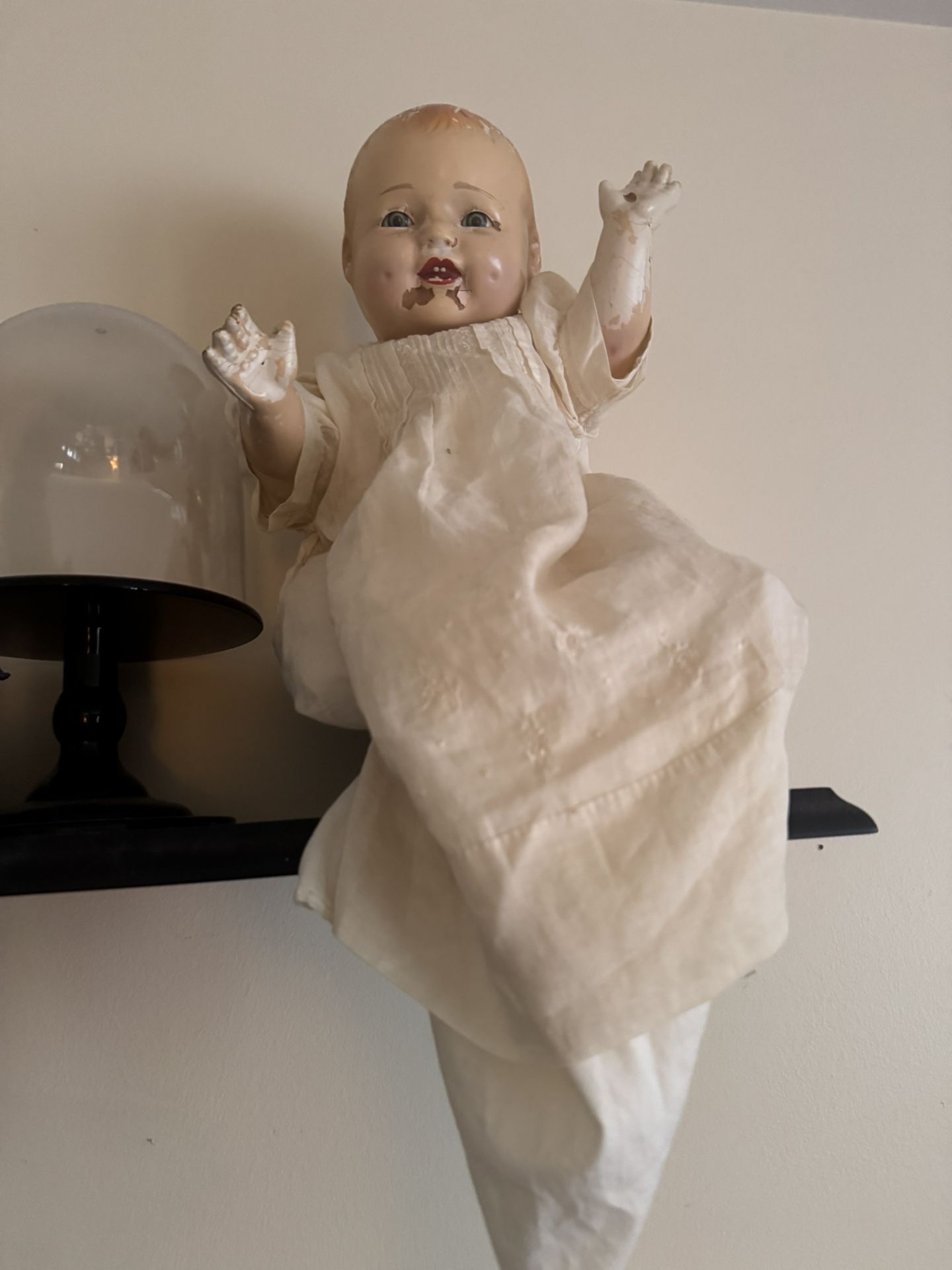 Creepy haunted antique baby