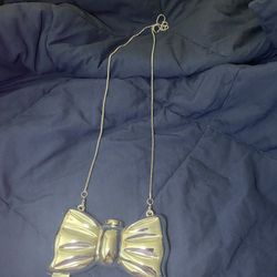 Small Sliver Bow Shaped Purse 