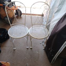 (2) Wrought Iron  Chairs  Going. Cheap