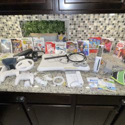 Wii console, games, and LOTS extras
