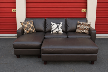 FREE DELIVERY & INSTALLATION LEATHER COUCH+OTTOMAN