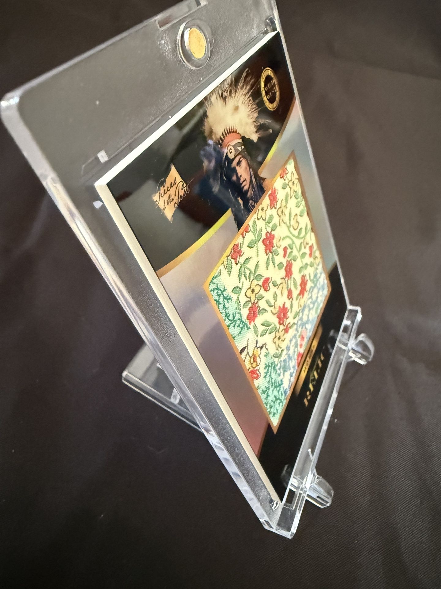 Pieces of the Past Wild West Edition Relic card featuring the Lakota war leader Crazy Horse. The small square of fabric in the center is an authentic