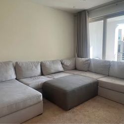 Spacious and large modular sectional sofa and ottoman